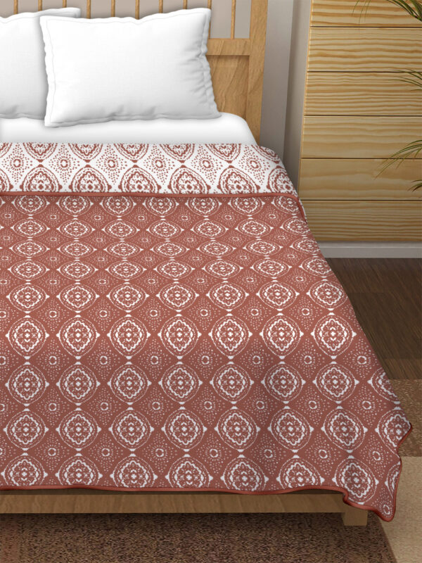 A double bed dohar is a type of bedding accessory that serves as a lightweight blanket or quilt.